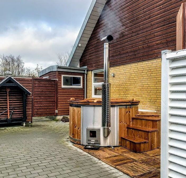 Wood burning hot tub with the integrated heater