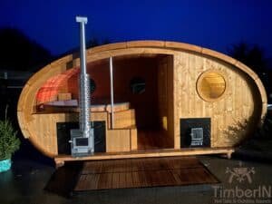 Outdoor oval sauna with an integrated hot tub (35)