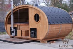 Outdoor oval sauna with an integrated hot tub (41)