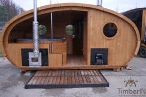 Outdoor oval sauna with an integrated hot tub (58)