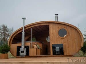 Outdoor oval sauna with an integrated hot tub (73)