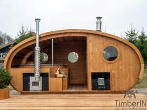 Outdoor oval sauna with an integrated hot tub (74)