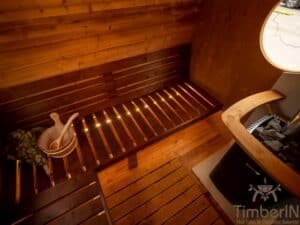 Outdoor oval sauna with an integrated hot tub (84)